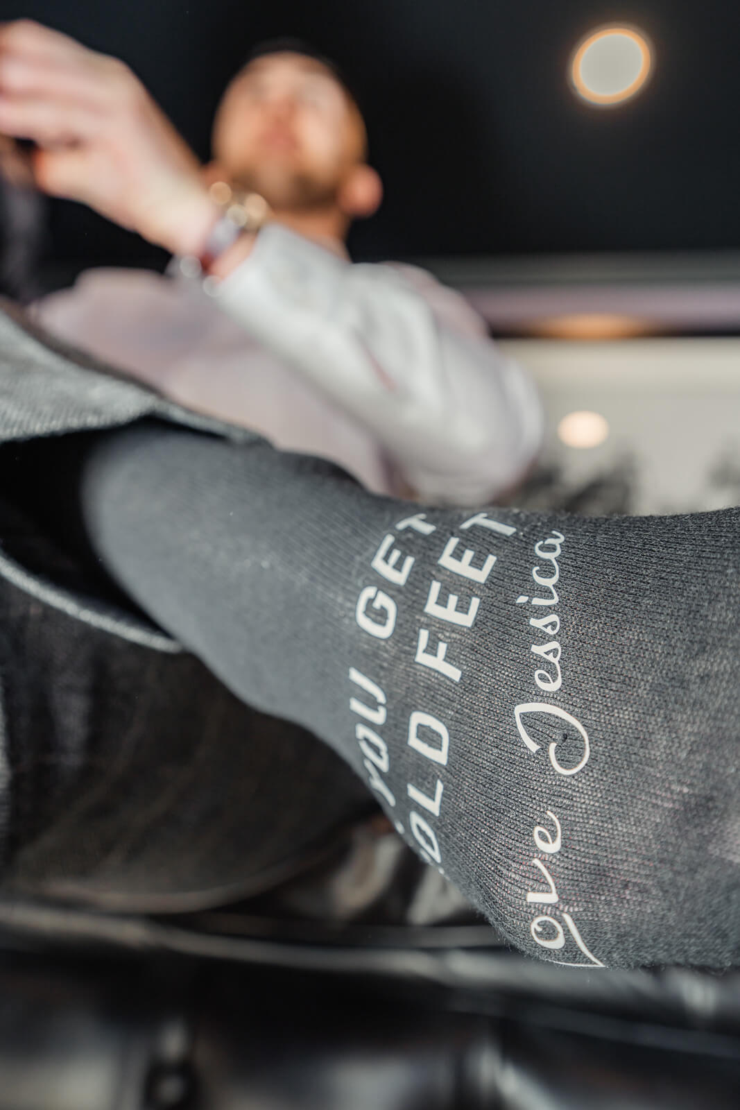 The groomsmen laugh and celebrate together in a circle during the reception, capturing the fun and energy of the night at Colshaw Hall Country Estate in Cheshire.