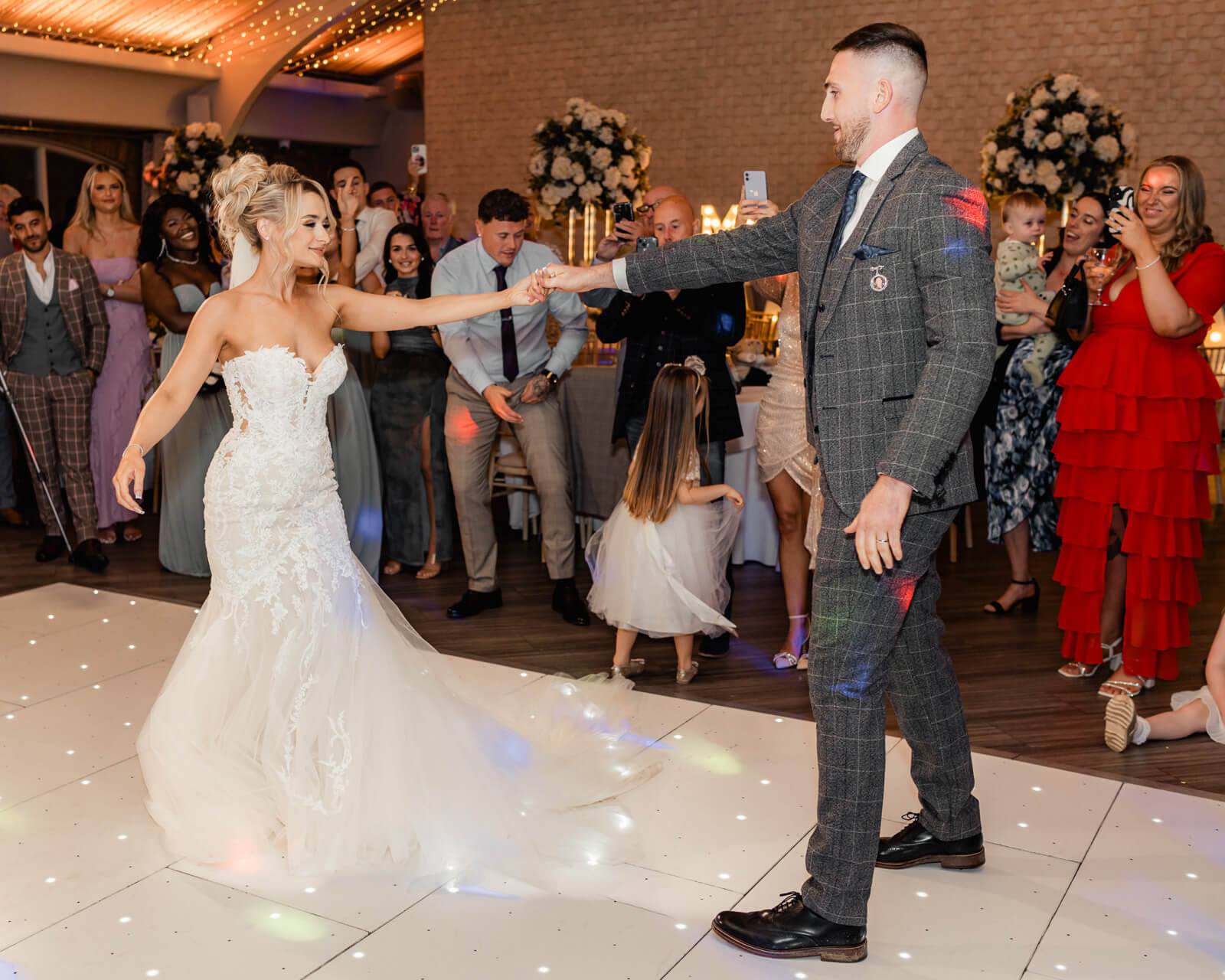 Bride twirling during first dance with groom at Elegant Wedding at Colshaw Hall Country Estate reception