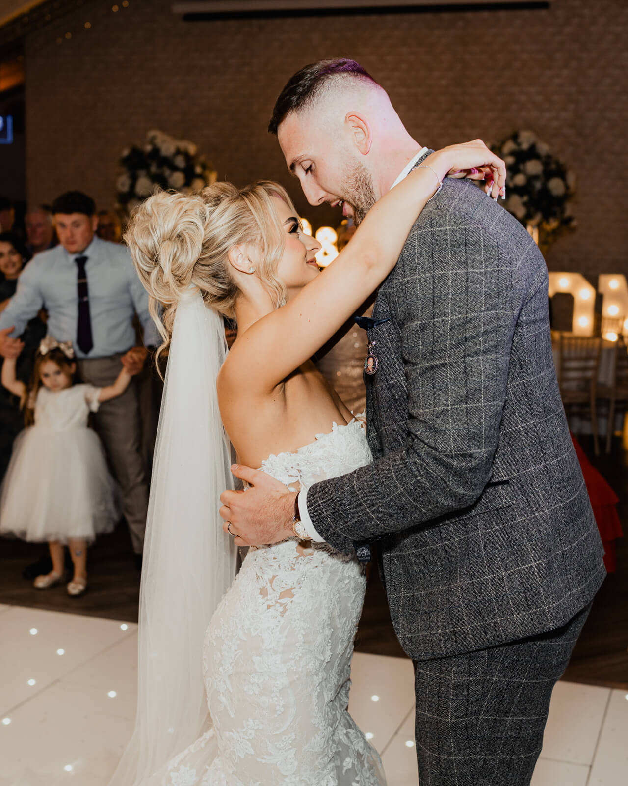 Bride and groom sharing an intimate first dance moment at Elegant Wedding at Colshaw Hall Country Estate reception