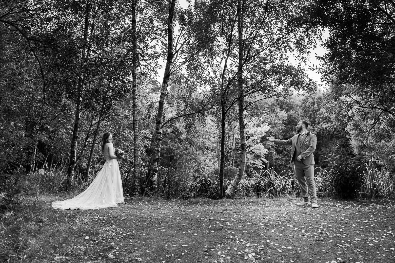 Bride and groom in woodland setting at Chevin Country Park during wedding portraits