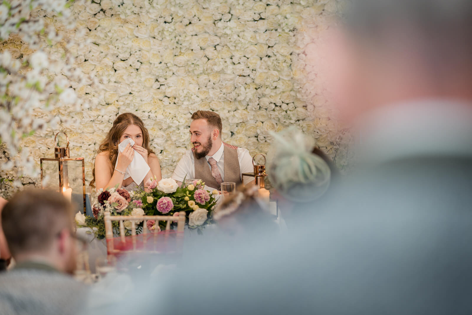 Bride wiping tears during speech at wedding reception Chevin Country Park