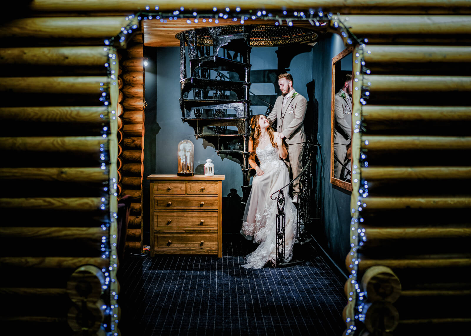 Bride and groom portrait framed by wooden doorway at Chevin Country Park