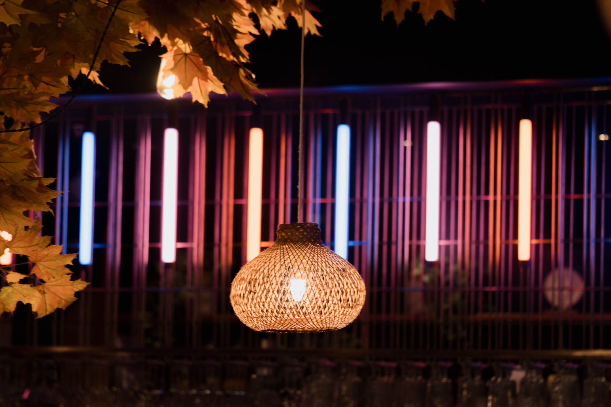 Decorative hanging lantern with colourful neon lights inside a Leeds restaurant.