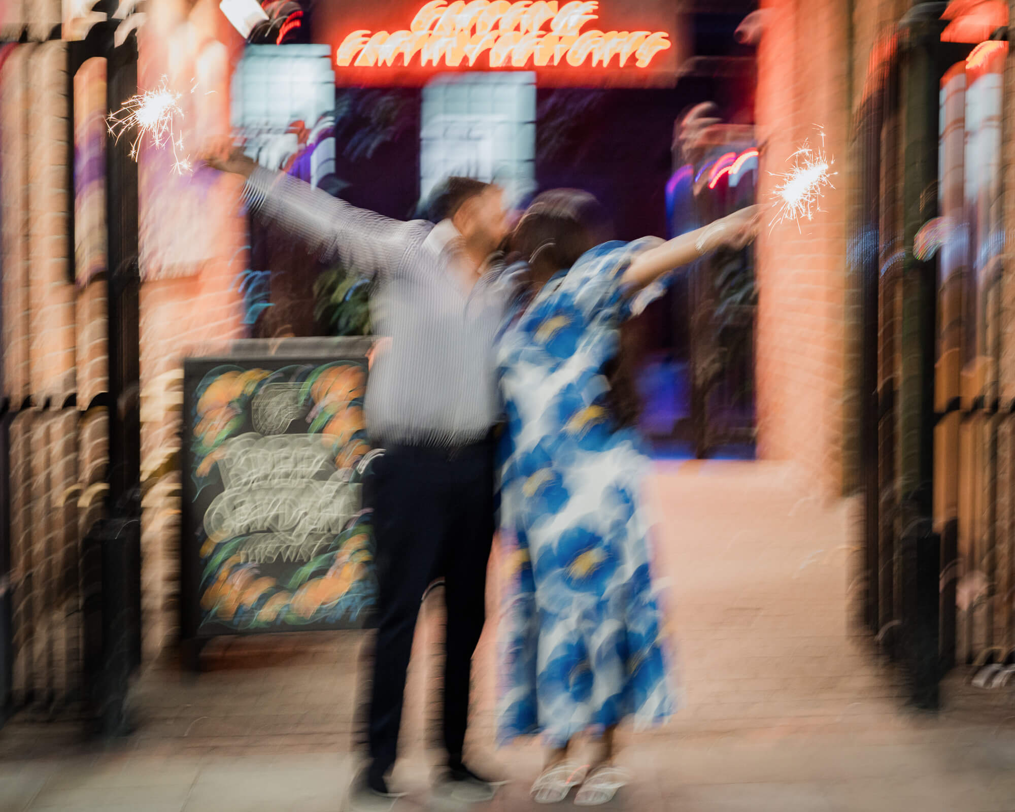 Creative long-exposure engagement photo with motion blur and sparklers during a Leeds pre-wedding photoshoot.