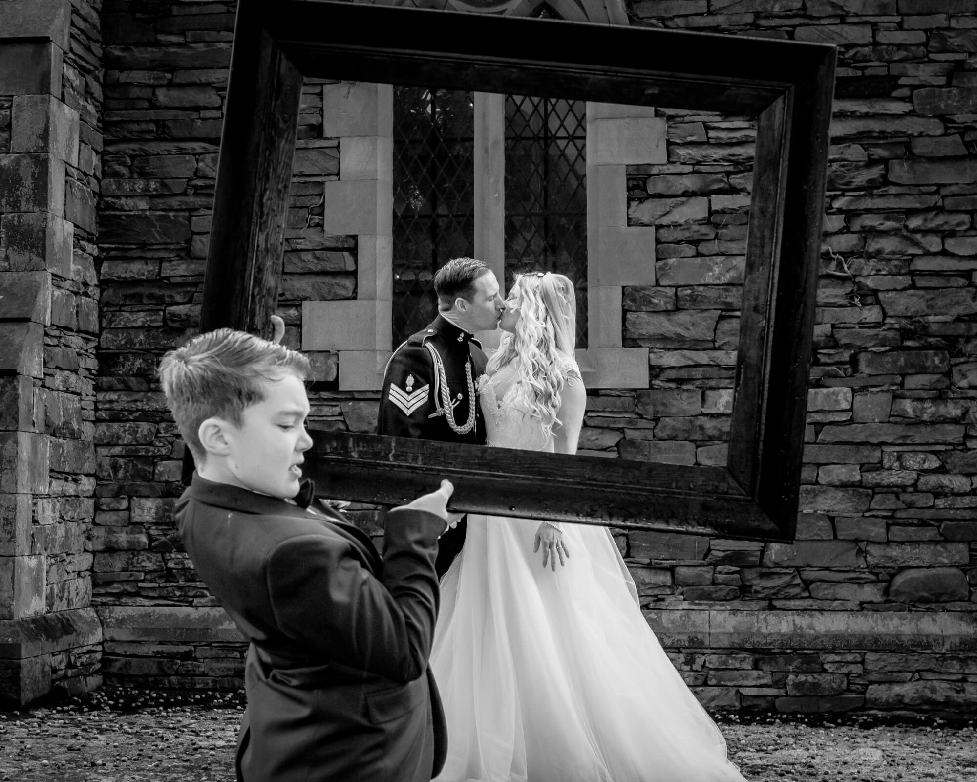 Creative documentary black and white wedding photograph of a couple