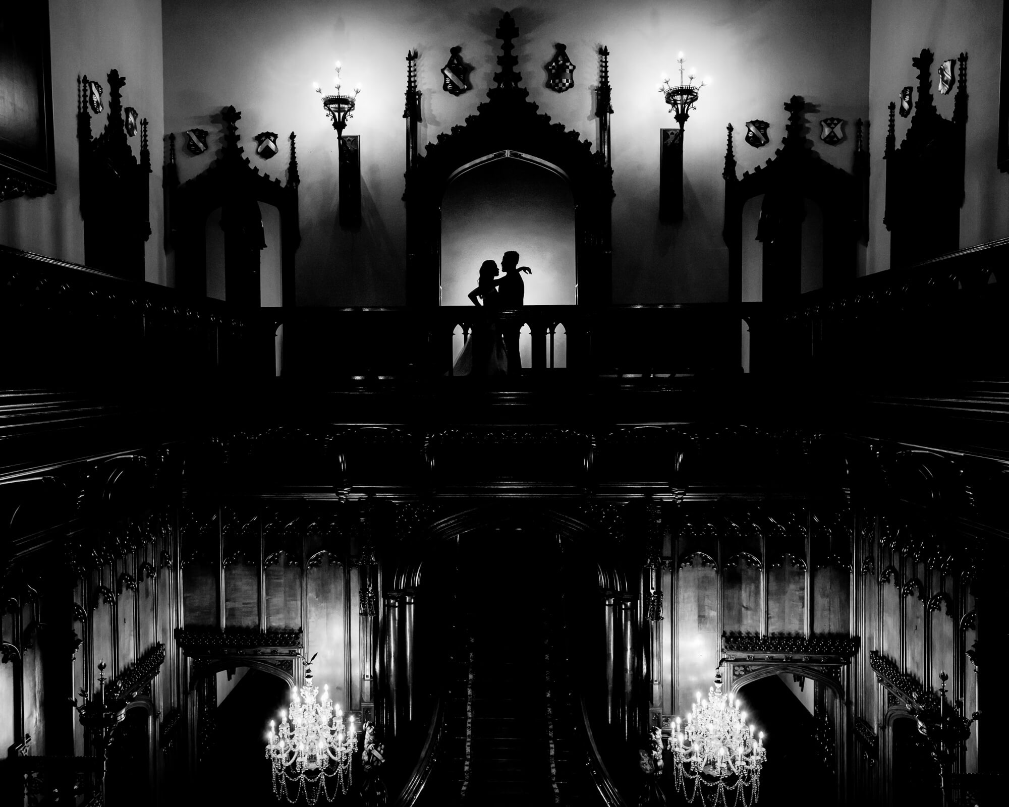Dramatic black and white wedding photography using light and silhouette