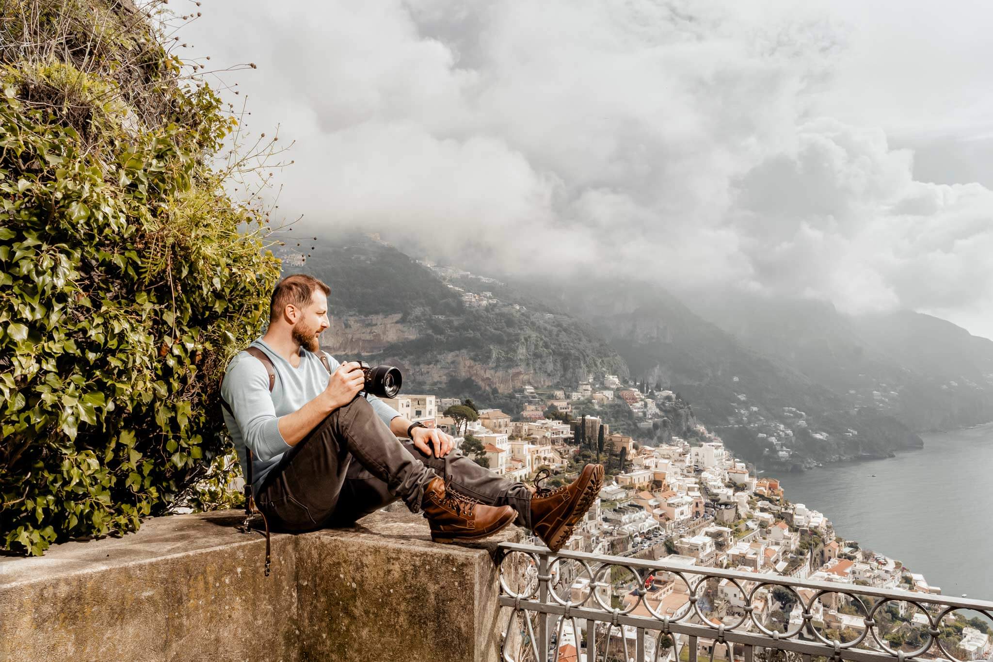 The Photographer looking towards the sea up on the hill in Amalfi.